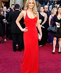 Jennifer_Lawrence_attending_the_2011_Academy_Awards_in_a_smoking_hot_red_dress_MQ_82.jpg
