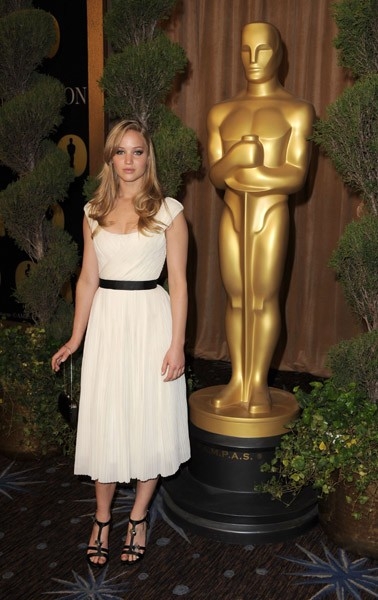 Jennifer_Lawrence_at_the_83rd_Academy_Awards_Nominations_in_a_beautiful_white_dress_09.jpg
