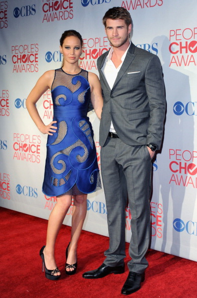 Jennifer_Lawrence_attending_the_2012_Peoples_Choice_Awards_in_a_sexy_see_through_blue_lace_dress_068.jpg