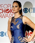 Jennifer_Lawrence_attending_the_2012_Peoples_Choice_Awards_in_a_sexy_see_through_blue_lace_dress_009.jpg