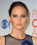 Jennifer_Lawrence_attending_the_2012_Peoples_Choice_Awards_in_a_sexy_see_through_blue_lace_dress_071.jpg