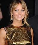 Jennifer_Lawrence_at_the_LA_premiere_of_The_Hunger_Games_begging_for_an_Oscar_in_a_gold_dress_165.jpg