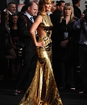 Jennifer_Lawrence_at_the_LA_premiere_of_The_Hunger_Games_begging_for_an_Oscar_in_a_gold_dress_166.jpg