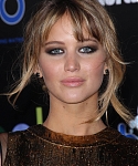 Jennifer_Lawrence_at_the_LA_premiere_of_The_Hunger_Games_begging_for_an_Oscar_in_a_gold_dress_176.jpg