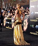 Jennifer_Lawrence_in_a_beautiful_gold_dress_at_the_premiere_of_The_Hunger_Games_003.jpg