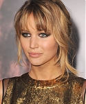 Jennifer_Lawrence_in_a_beautiful_gold_dress_at_the_premiere_of_The_Hunger_Games_056.jpg