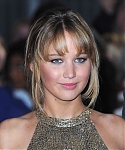 Jennifer_Lawrence_at_the_London_premiere_of_The_Hunger_Games_begging_for_an_Oscar_in_a_gold_dress_069.jpg