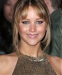 Jennifer_Lawrence_at_the_London_premiere_of_The_Hunger_Games_begging_for_an_Oscar_in_a_gold_dress_072.jpg
