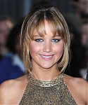 Jennifer_Lawrence_at_the_London_premiere_of_The_Hunger_Games_begging_for_an_Oscar_in_a_gold_dress_082.jpg