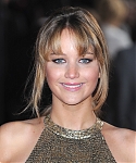 Jennifer_Lawrence_at_the_London_premiere_of_The_Hunger_Games_begging_for_an_Oscar_in_a_gold_dress_085.jpg