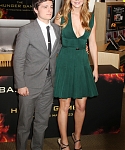 Jennifer_Lawrence_wearing_a_cute_low_cut_green_dress_at_a_book_signing_for_The_Hunger_Games_25.jpg