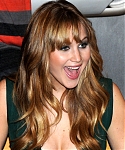 Jennifer_Lawrence_wearing_a_cute_low_cut_green_dress_at_a_book_signing_for_The_Hunger_Games_50.jpg