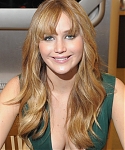 Jennifer_Lawrence_wearing_a_cute_low_cut_green_dress_at_a_book_signing_for_The_Hunger_Games_56.jpg
