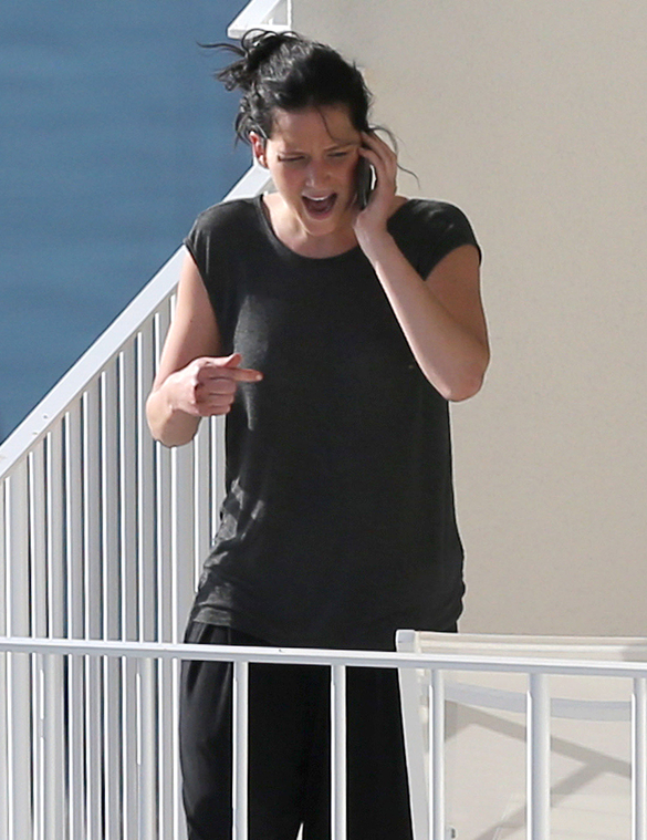 February_27_-_Jennifer_Lawrence_is_seen_enjoying_the_view_from_her_hotel_room_in_Hawaii_281229.jpg