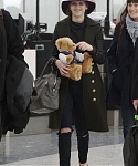 February_11_-_Jennifer_Lawrence_at_Heathrow_Airport_in_London_281329.jpg