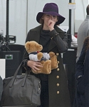 February_11_-_Jennifer_Lawrence_at_Heathrow_Airport_in_London_28729.jpg