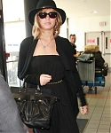 May_12_-_Jennifer_Lawrence_arriving_at_LAX_Airport_in_Los_Angeles_281029.jpg