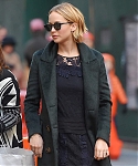 November_15_-_Leaving_her_hotel_in_New_York_City_before_she_heads_to_Mockingjay_Fan_Press_Event_282029.jpg