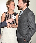 XS_March_21_-_Attends_a_screening_of___Serena___282729.jpg