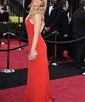 Jennifer_Lawrence_attending_the_2011_Academy_Awards_in_a_smoking_hot_red_dress_MQ_14.jpg