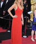 Jennifer_Lawrence_attending_the_2011_Academy_Awards_in_a_smoking_hot_red_dress_MQ_15.jpg