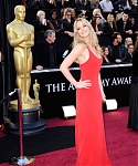 Jennifer_Lawrence_attending_the_2011_Academy_Awards_in_a_smoking_hot_red_dress_MQ_18.jpg