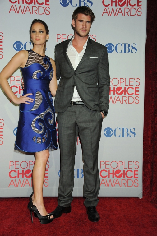 Jennifer_Lawrence_attending_the_2012_Peoples_Choice_Awards_in_a_sexy_see_through_blue_lace_dress_067.jpg