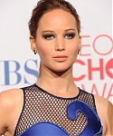 Jennifer_Lawrence_attending_the_2012_Peoples_Choice_Awards_in_a_sexy_see_through_blue_lace_dress_105.jpg