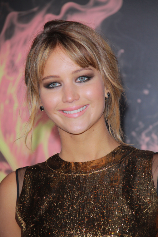 Jennifer_Lawrence_at_the_LA_premiere_of_The_Hunger_Games_begging_for_an_Oscar_in_a_gold_dress_108.jpg