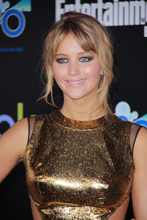 Jennifer_Lawrence_at_the_LA_premiere_of_The_Hunger_Games_begging_for_an_Oscar_in_a_gold_dress_115.jpg