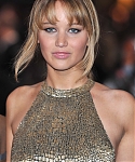 Jennifer_Lawrence_at_the_London_premiere_of_The_Hunger_Games_begging_for_an_Oscar_in_a_gold_dress_011.jpg