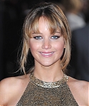Jennifer_Lawrence_at_the_London_premiere_of_The_Hunger_Games_begging_for_an_Oscar_in_a_gold_dress_057.jpg