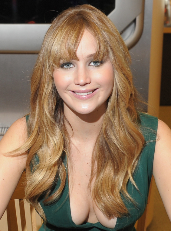 Jennifer_Lawrence_wearing_a_cute_low_cut_green_dress_at_a_book_signing_for_The_Hunger_Games_56.jpg