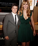 Jennifer_Lawrence_wearing_a_cute_low_cut_green_dress_at_a_book_signing_for_The_Hunger_Games_24.jpg