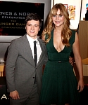 Jennifer_Lawrence_wearing_a_cute_low_cut_green_dress_at_a_book_signing_for_The_Hunger_Games_28.jpg