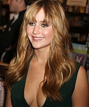 Jennifer_Lawrence_wearing_a_cute_low_cut_green_dress_at_a_book_signing_for_The_Hunger_Games_49.jpg