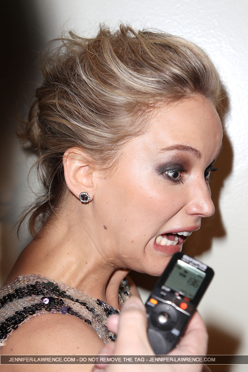 XS_March_21_-_Attends_a_screening_of___Serena___281929.JPG